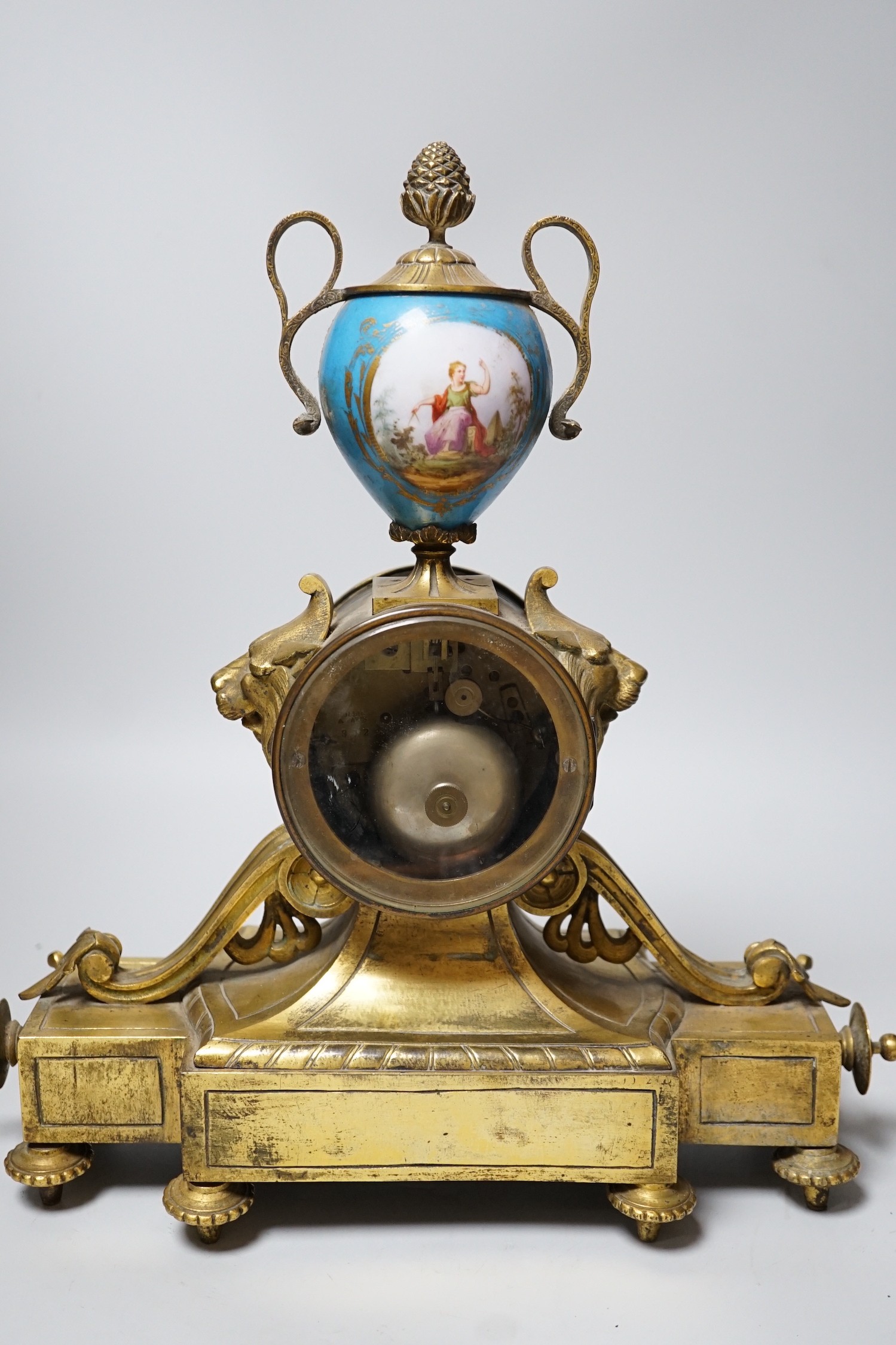 A Sevres style porcelain mounted ormolu mantel clock, 36cms high
